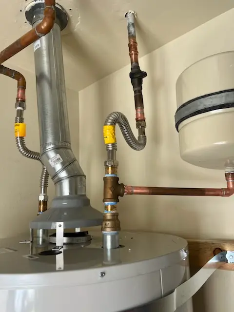 Water heater installation and plumbing repair in Wea